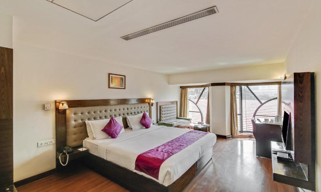 Двухместный (Стандартный двухместный номер с 1 кроватью или 2 отдельными кроватями) отеля The Monarch - Brigade Road, Бангалор