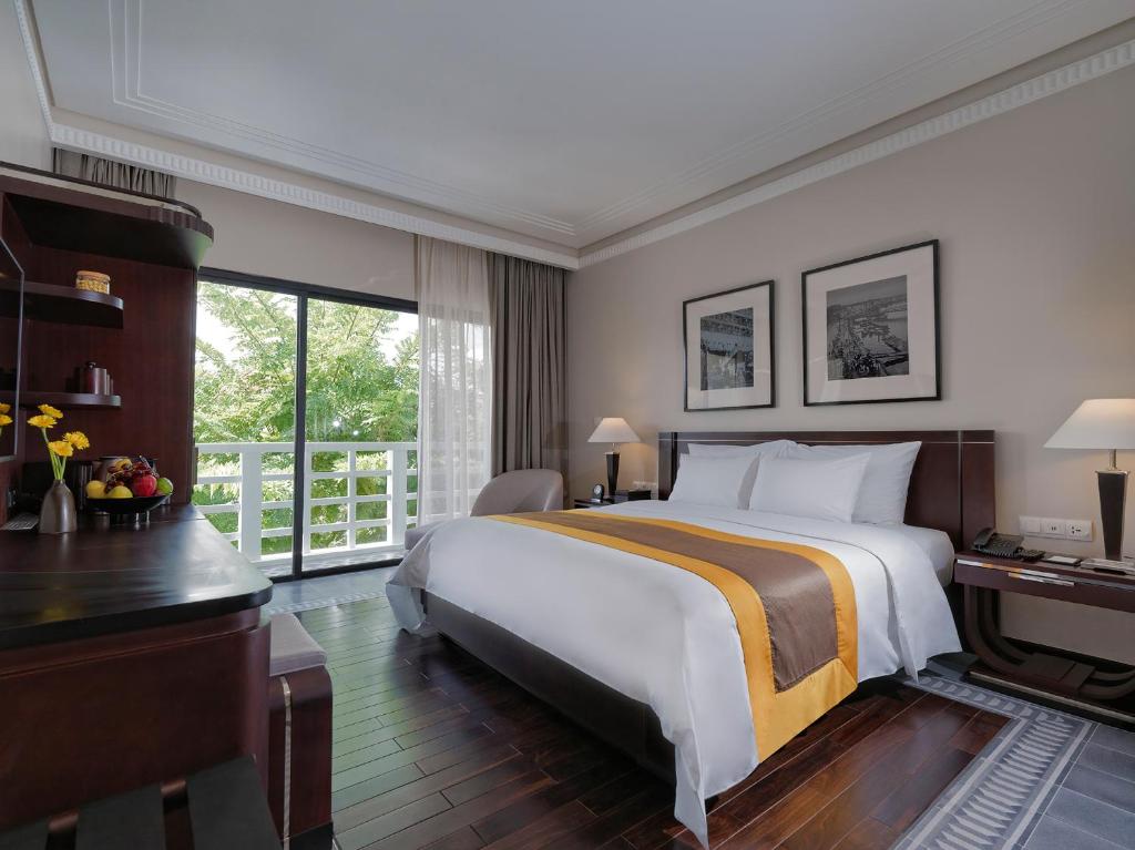 Двухместный (Улучшенный двухместный номер с 1 кроватью или 2 отдельными кроватями и видом на сад) отеля La Residence Hue Hotel & Spa, Хюэ