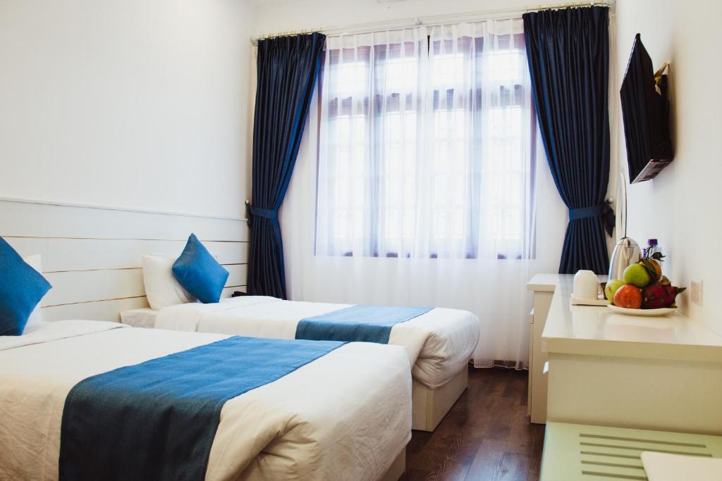 Двухместный (Двухместный номер Делюкс с 1 кроватью или 2 отдельными кроватями) отеля Windsor Hotel Son La, Шонла