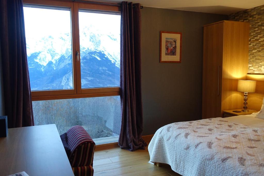 Двухместный (Роскошный двухместный номер с 1 кроватью или 2 отдельными кроватями, вид на долину) отеля Chalet Grand Loup, Нанда