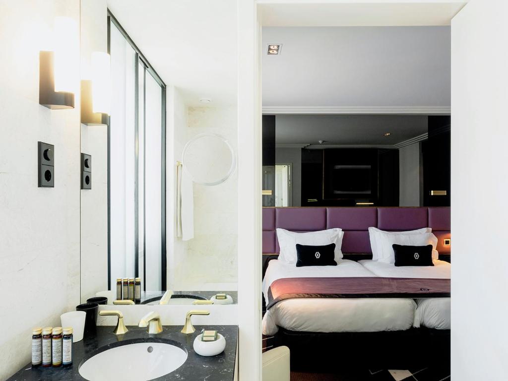 Двухместный (Улучшенный двухместный номер с 1 кроватью или 2 отдельными кроватями) отеля Altis Avenida Hotel, Лиссабон