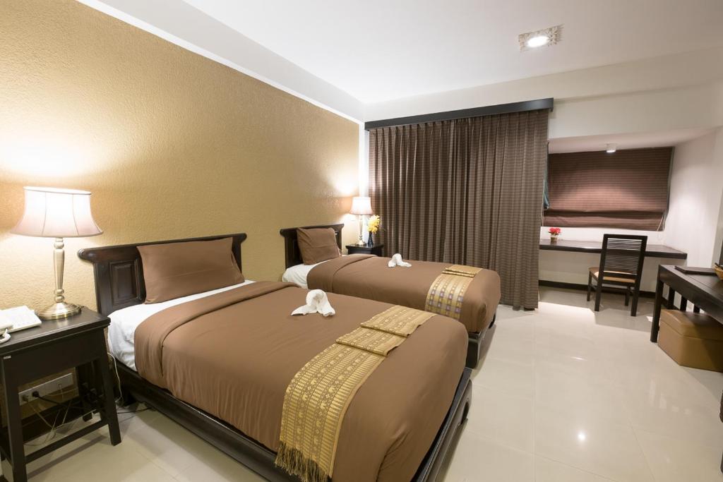 Двухместный (Двухместный номер Делюкс с 1 кроватью) отеля Siam Piman Hotel, Бангкок