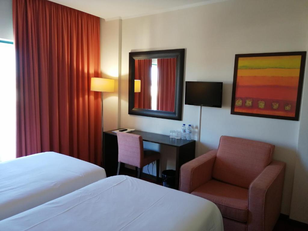 Двухместный (Двухместный номер с 2 отдельными кроватями) отеля Hotel Monaco, Фару