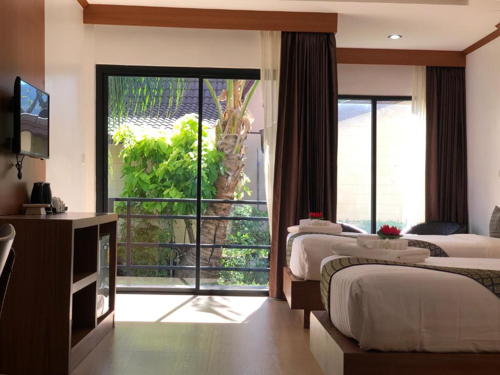 Двухместный (Двухместный номер Делюкс с 1 кроватью или 2 отдельными кроватями) курортного отеля Phi Phi Villa Resort, Пхи-Пхи