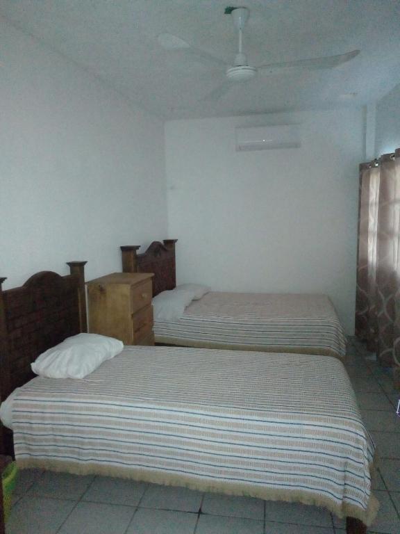 Двухместный (Двухместный номер с 2 отдельными кроватями) отеля Posada la istmeña, Салина-Крус