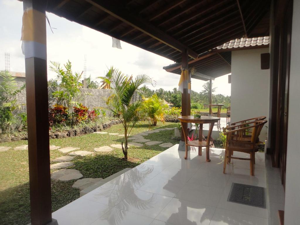 Номер (Бунгало Делюкс с видом на сад), Paraiso Cottage Ubud