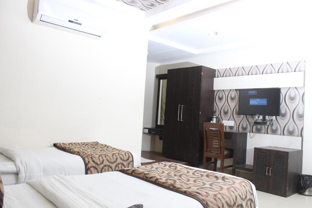 Двухместный (Двухместный номер с 1 кроватью или 2 отдельными кроватями) отеля Hotel Galaxy, Аллахабад
