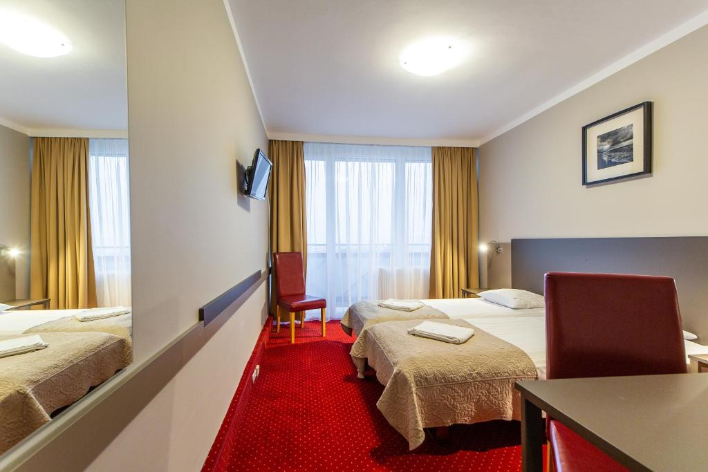 Двухместный (Двухместный номер с 1 кроватью и балконом) отеля Hotel New Skanpol, Колобжег