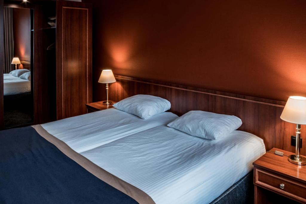 Двухместный (Стандартный двухместный номер с 2 отдельными кроватями) отеля Hotel ten Cate Emmen, Гронинген