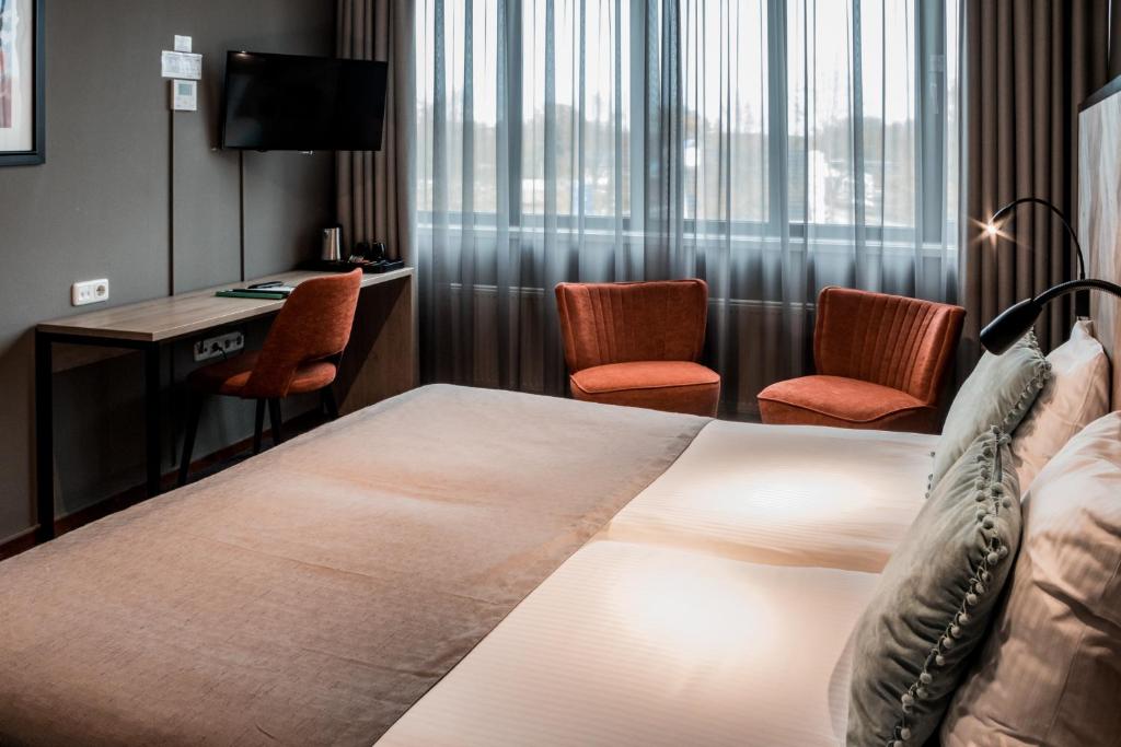 Двухместный (Представительский двухместный номер с 1 кроватью или 2 отдельными кроватями) отеля Hotel ten Cate Emmen, Гронинген