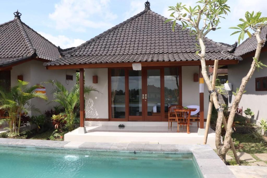 Номер (Бунгало Делюкс с видом на бассейн), Paraiso Cottage Ubud