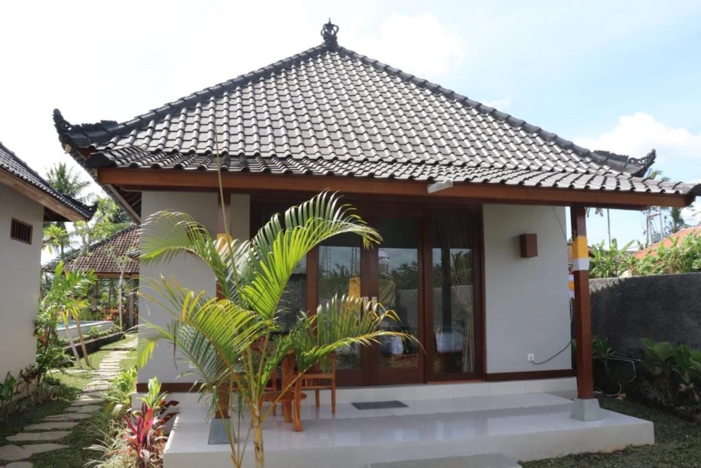 Номер (Бунгало Делюкс с видом на сад), Paraiso Cottage Ubud