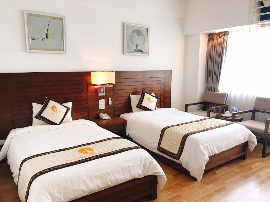 Двухместный (Двухместный номер Делюкс с 2 отдельными кроватями и видом на озеро) отеля Quang Ba Trade Union Hotel, Ханой