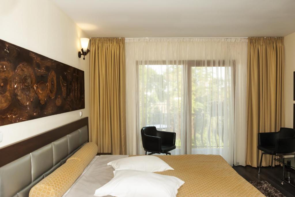 Двухместный (Двухместный номер Делюкс с 1 кроватью или 2 отдельными кроватями, доступ к бассейну) отеля Hotel Grand, Эфорие-Норд