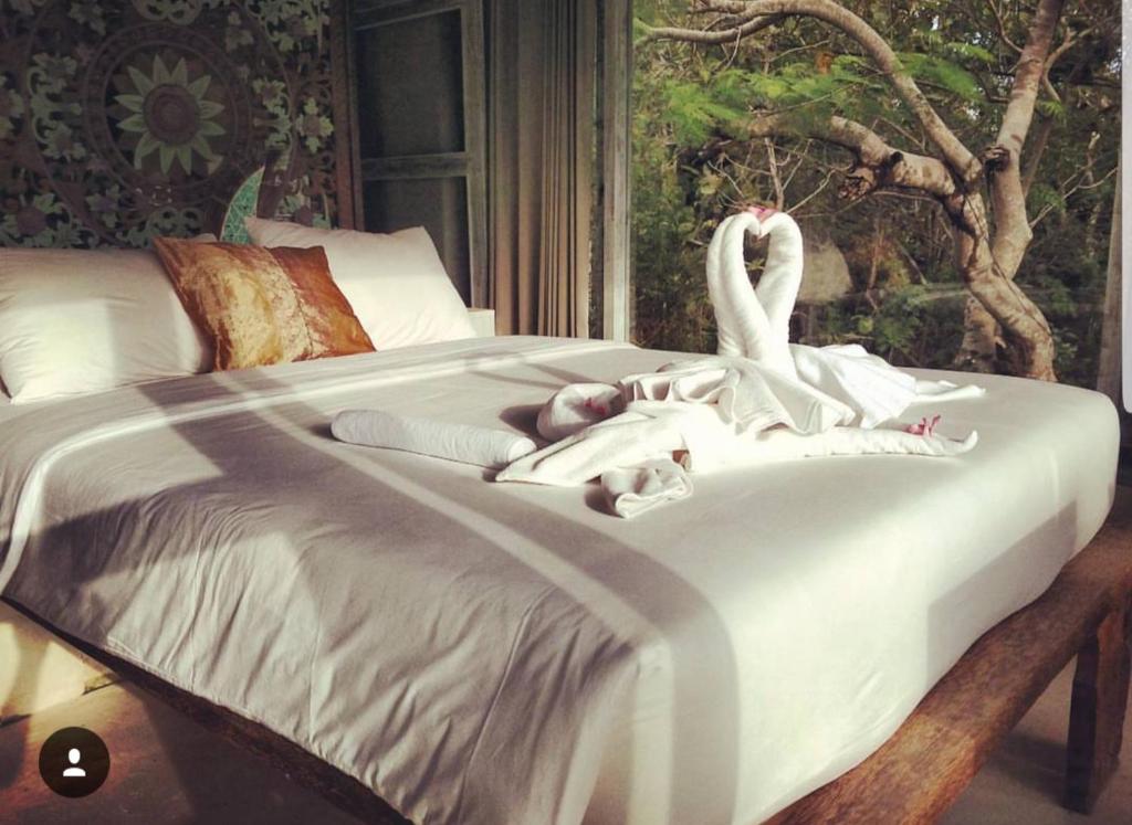 Двухместный (Улучшенный двухместный номер с 1 кроватью или 2 отдельными кроватями) отеля BoHo Bingin Beach Bali, Улувату