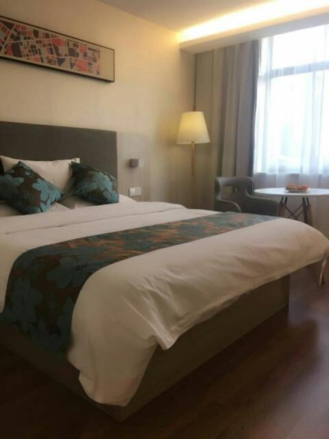 Двухместный (Двухместный номер Делюкс с 1 кроватью) отеля Hanting Hotel Shanghai Middle Ring Hunan Road, Шанхай