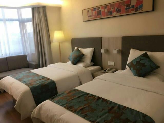 Двухместный (Двухместный номер Делюкс с 2 отдельными кроватями) отеля Hanting Hotel Shanghai Middle Ring Hunan Road, Шанхай