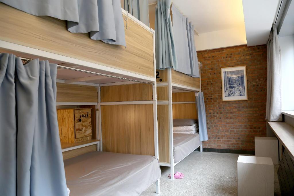Номер (Кровать в общем номере для женщин с 4 кроватями) хостела LazyBee International Youth Hostel Shenyang, Шэньян