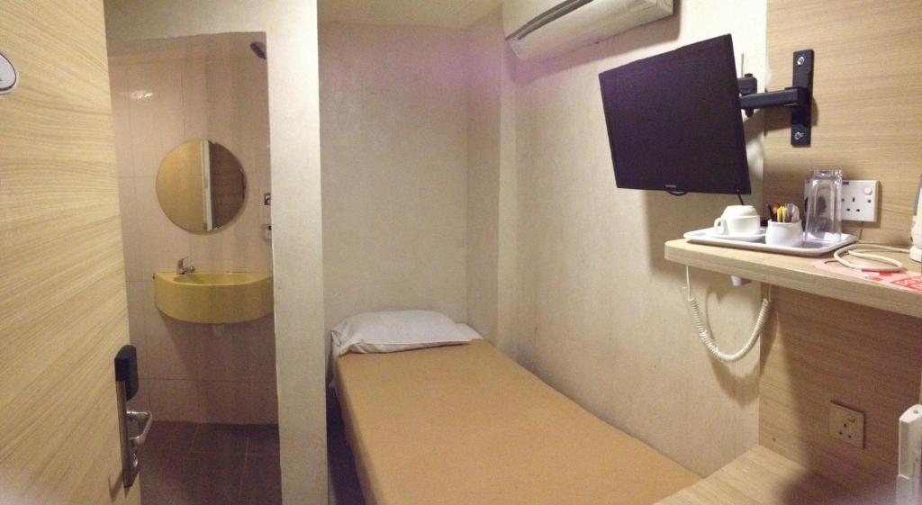 Одноместный (Стандартный одноместный номер) отеля Arianna Hotel, Сингапур (город)
