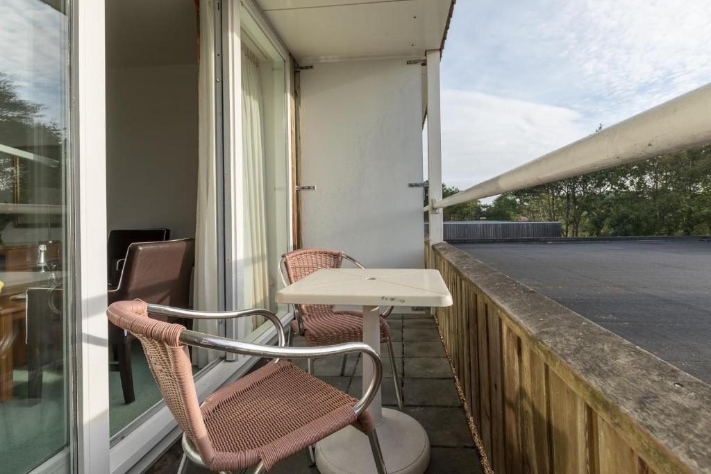 Двухместный (Двухместный номер с 1 кроватью и балконом) отеля Fletcher Hotel Resort Amelander Kaap, Гронинген