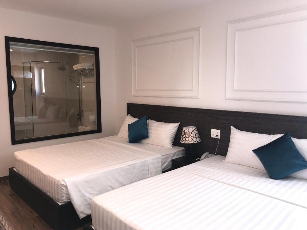 Двухместный (Стандартный двухместный номер с 1 кроватью или 2 отдельными кроватями) отеля Marina Nha Trang Hotel, Нячанг