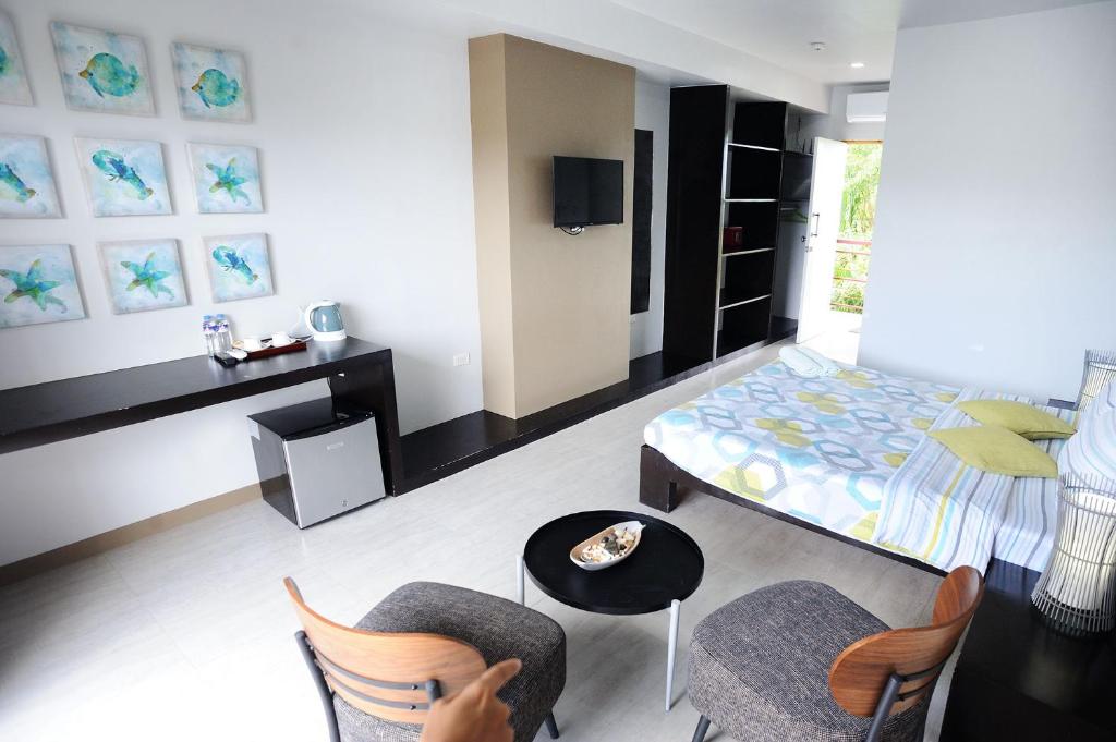Двухместный (Двухместный номер Делюкс с 1 кроватью и балконом) курортного отеля Tamarind, Панглао