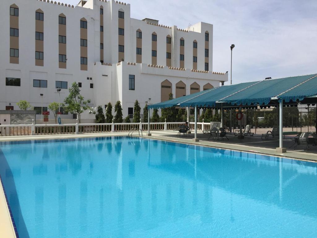 Hotel Al Madinah Holiday, Маскат