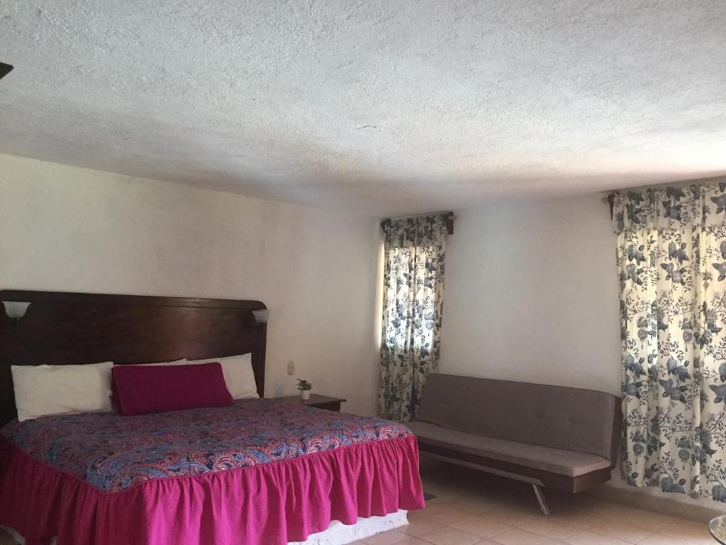 Двухместный (Номер Делюкс с кроватью размера «king-size») отеля Hotel Ollin Teotl, Сан-Хуан-Теотиуакан