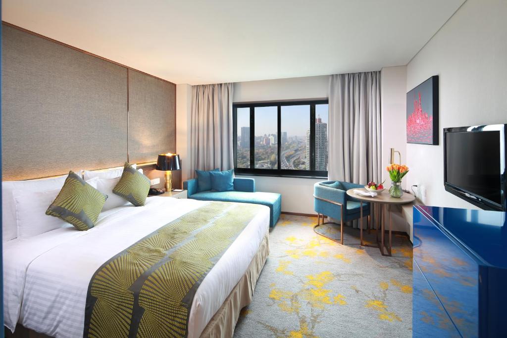 Двухместный (Номер Делюкс с кроватью размера «king-size») отеля Jin Jiang Rainbow Hotel, Шанхай