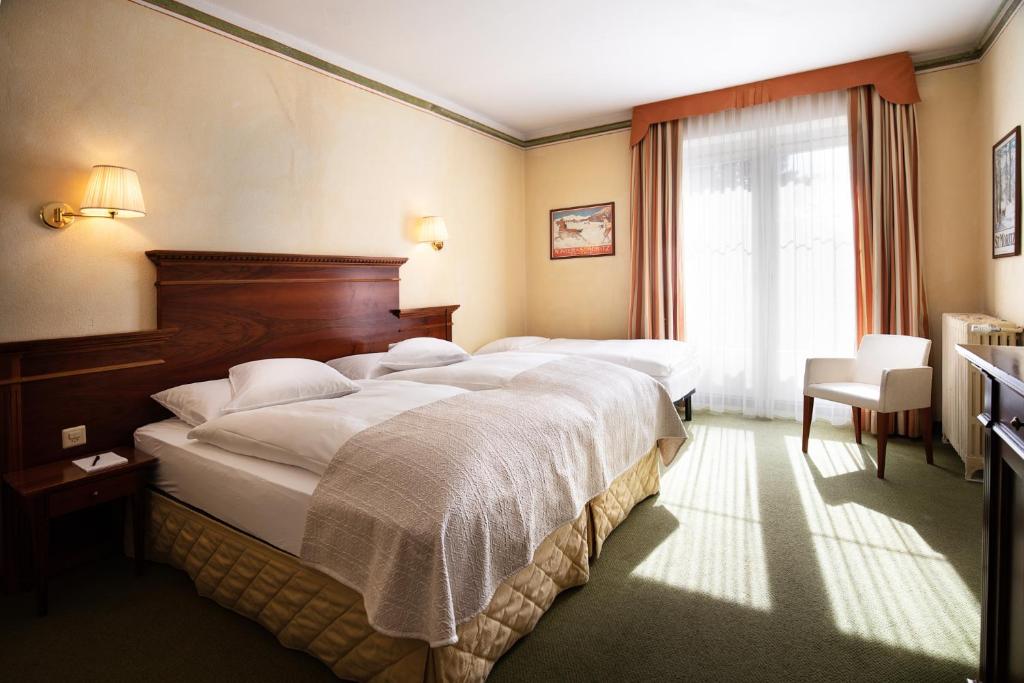 Трехместный (Трехместный номер эконом-класса) отеля Hotel Reine Victoria by Laudinella, Санкт-Мориц