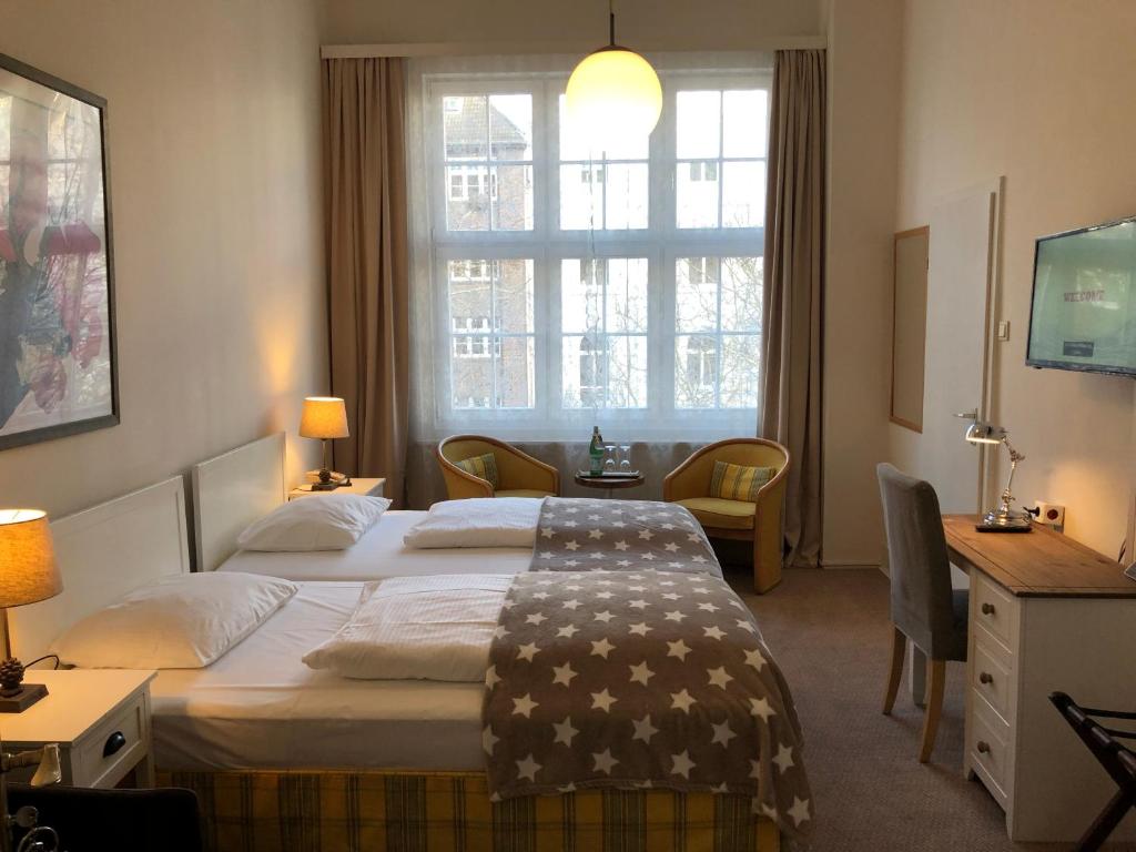 Двухместный (Двухместный номер с 2 отдельными кроватями) отеля Hotel Fresena im Dammtorpalais, Гамбург
