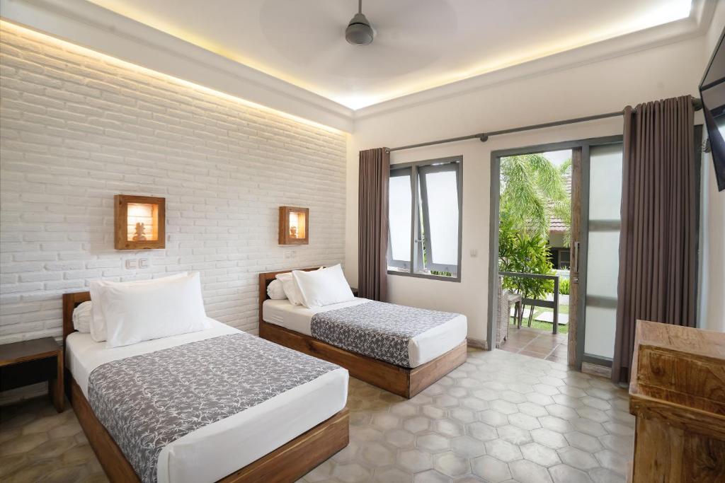 Двухместный (Стандартный двухместный номер с 2 отдельными кроватями) отеля Casa Asia, Улувату