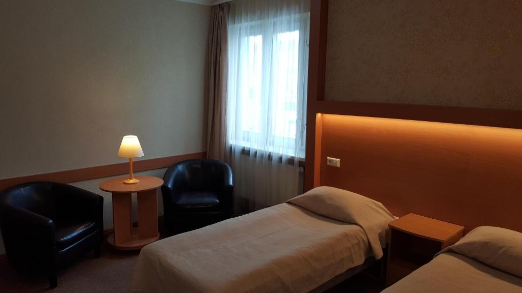 Двухместный (Двухместный номер с 2 отдельными кроватями) отеля Home Hotel, Каунас