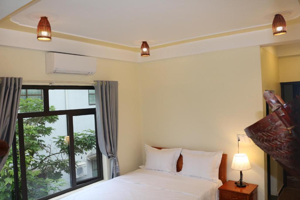 Двухместный (Двухместный номер Делюкс с 1 кроватью) отеля Phong Nha Coco House, Донгхой