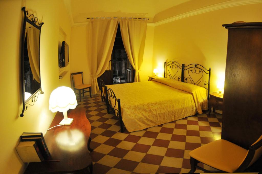 Двухместный (Двухместный номер с 1 кроватью или 2 отдельными кроватями) отеля Al Duomo Inn, Катания