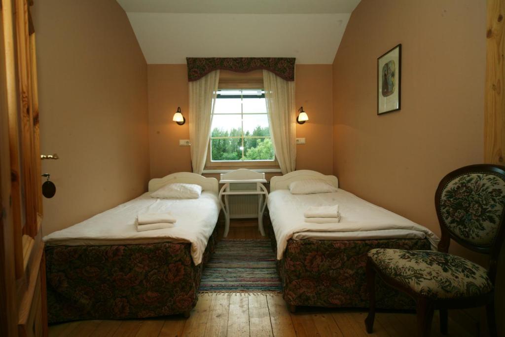 Двухместный (Двухместный номер эконом-класса с 2 отдельными кроватями и общей ванной комнатой) отеля Marcienas Muiza & SPA, Екабпилс