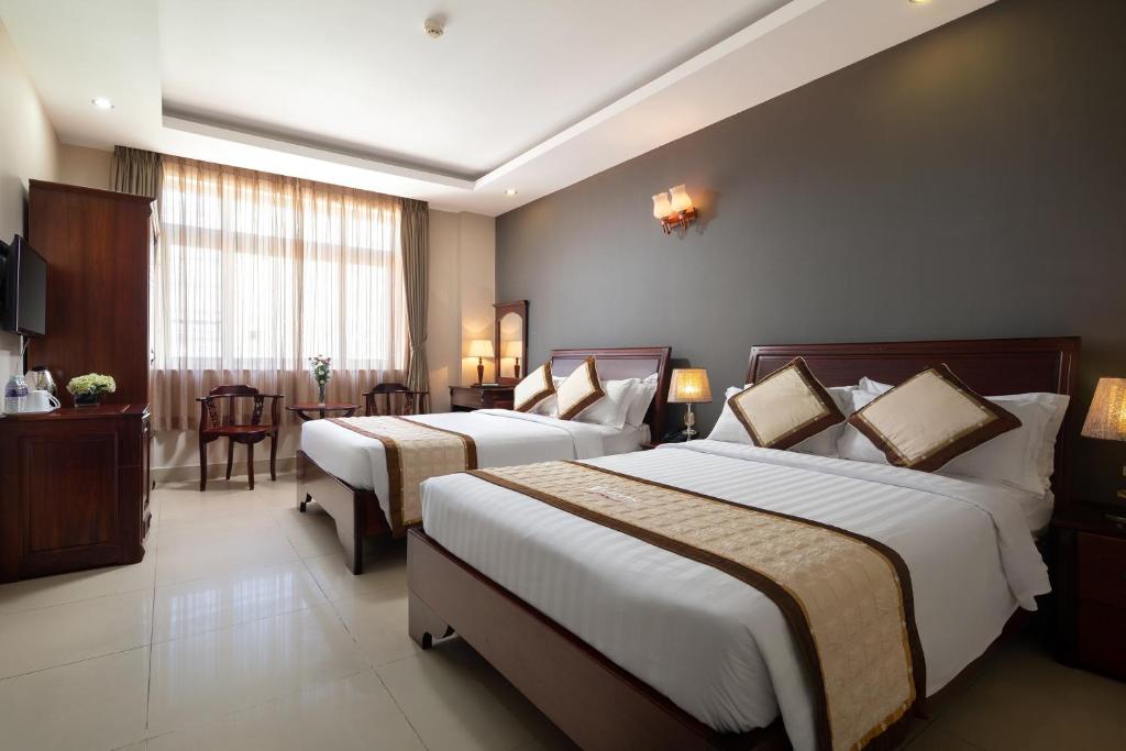 Четырехместный (Четырехместный номер Делюкс) отеля Corvin Hotel, Вунгтау