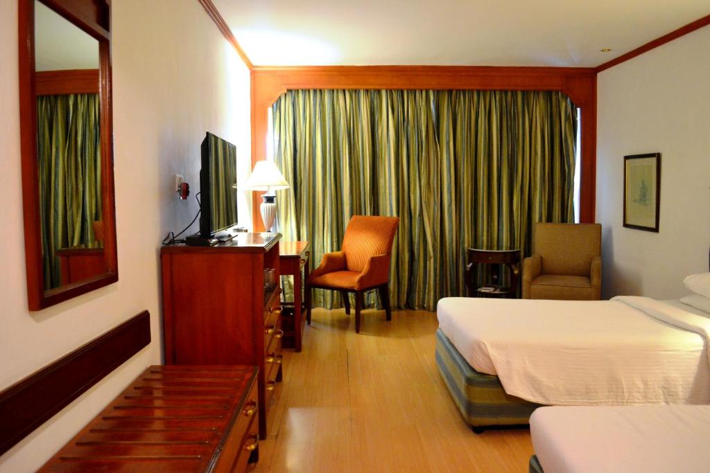 Сьюит (Стандартный двухместный номер с 2 отдельными кроватями) отеля Taj Banjara, Хайдарабад