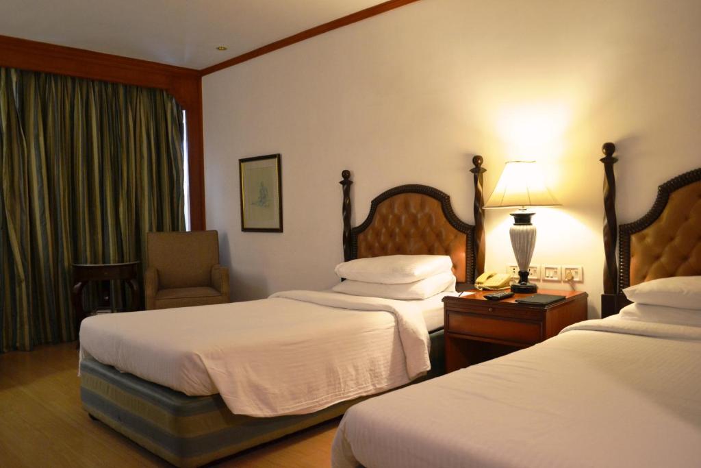 Двухместный (Улучшенный двухместный номер с 2 отдельными кроватями и видом на город) отеля Taj Banjara, Хайдарабад