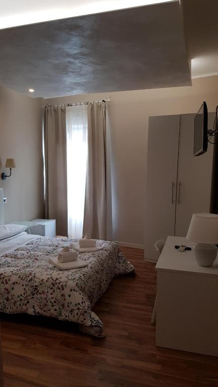 Трехместный (Трехместный номер с ванной комнатой) отеля Albergo la Svolta, Брешиа