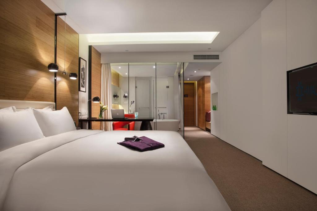 Двухместный (Улучшенный номер Делюкс с кроватью размера «queen-size» - Бесплатный мини-бар) отеля Himalayas Hotel Qingdao, Циндао