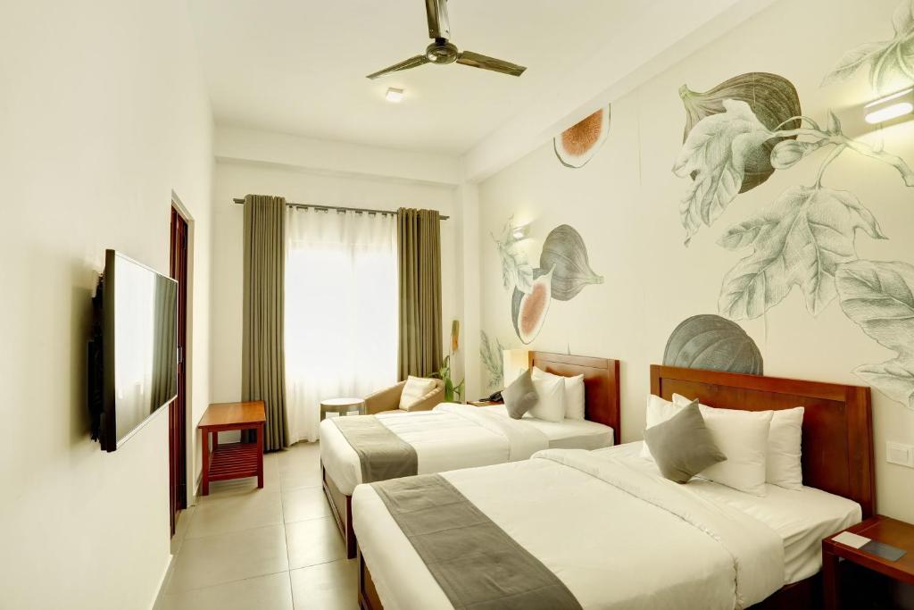 Двухместный (Улучшенный двухместный номер с 2 отдельными кроватями и видом на океан) отеля dwell, Коломбо