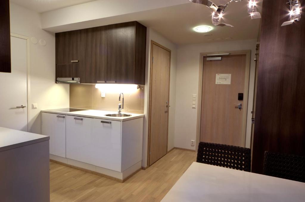 Апартаменты (Улучшенные апартаменты с 1 спальней и сауной - В стоимость не входит посещение спа-центра) отеля Holiday Club Saimaa, Рауха