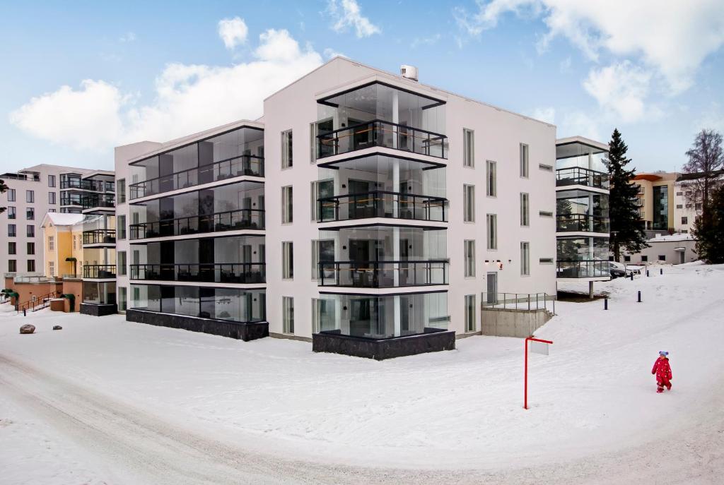 Апартаменты (Улучшенные апартаменты с 2 спальнями и сауной - Дополнительное здание - Вход в спа-центр не включен в стоимость) отеля Holiday Club Saimaa, Рауха