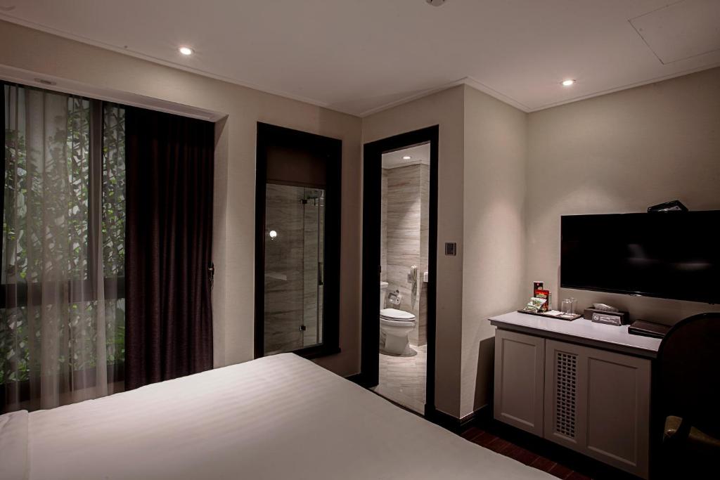 Двухместный (Стандартный двухместный номер с 1 кроватью или 2 отдельными кроватями) отеля The Chi Boutique Hotel, Ханой