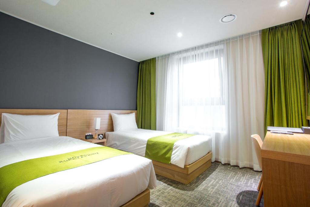 Двухместный (Двухместный номер Делюкс с 2 отдельными кроватями) отеля Hotel Kuretakeso Insadong, Сеул