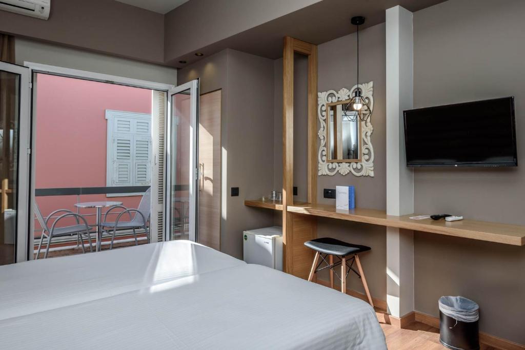 Двухместный (Стандартный двухместный номер с 1 кроватью или 2 отдельными кроватями, вид на город) отеля Agamemnon Hotel, Нафплион