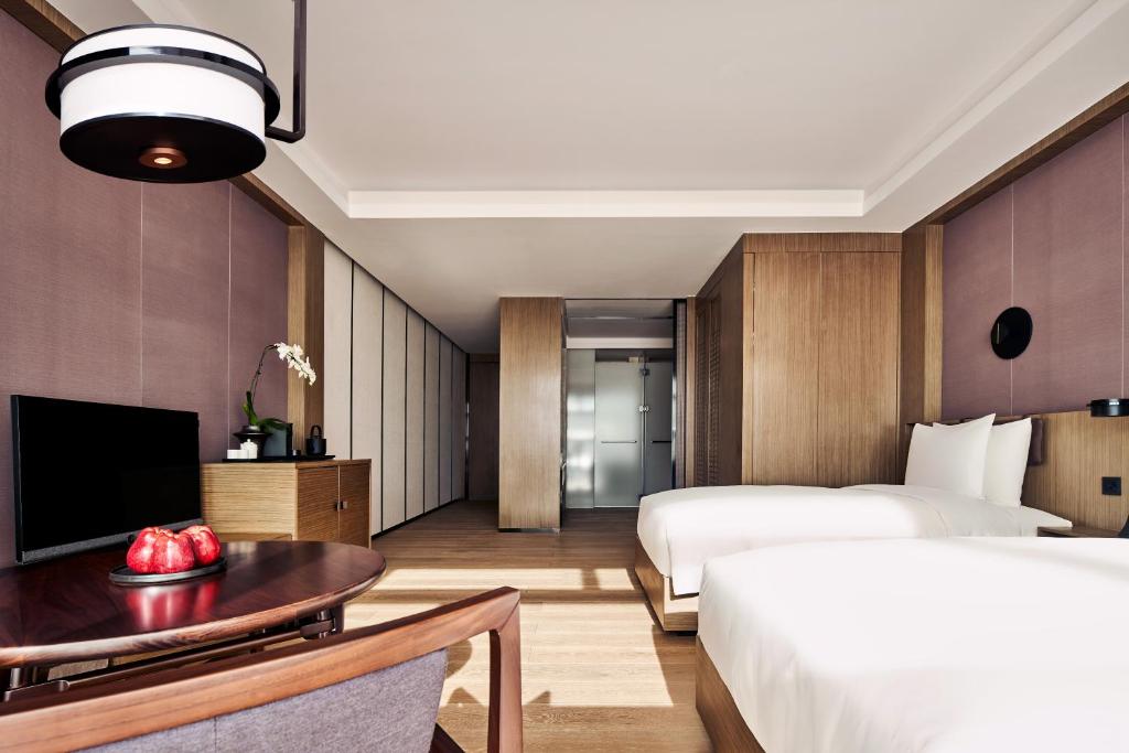 Двухместный (Двухместный номер Делюкс с 2 отдельными кроватями) отеля The PuXuan Hotel and Spa, Пекин