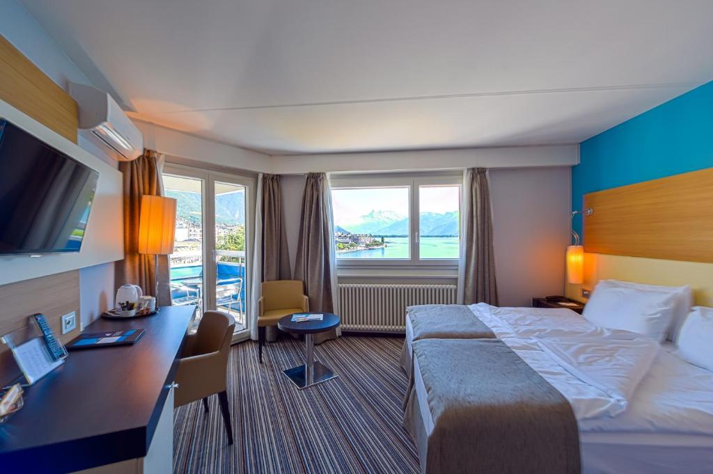Двухместный (Классический двухместный номер с 1 кроватью или 2 отдельными кроватями и видом на озеро) отеля Eurotel Montreux, Монтрё