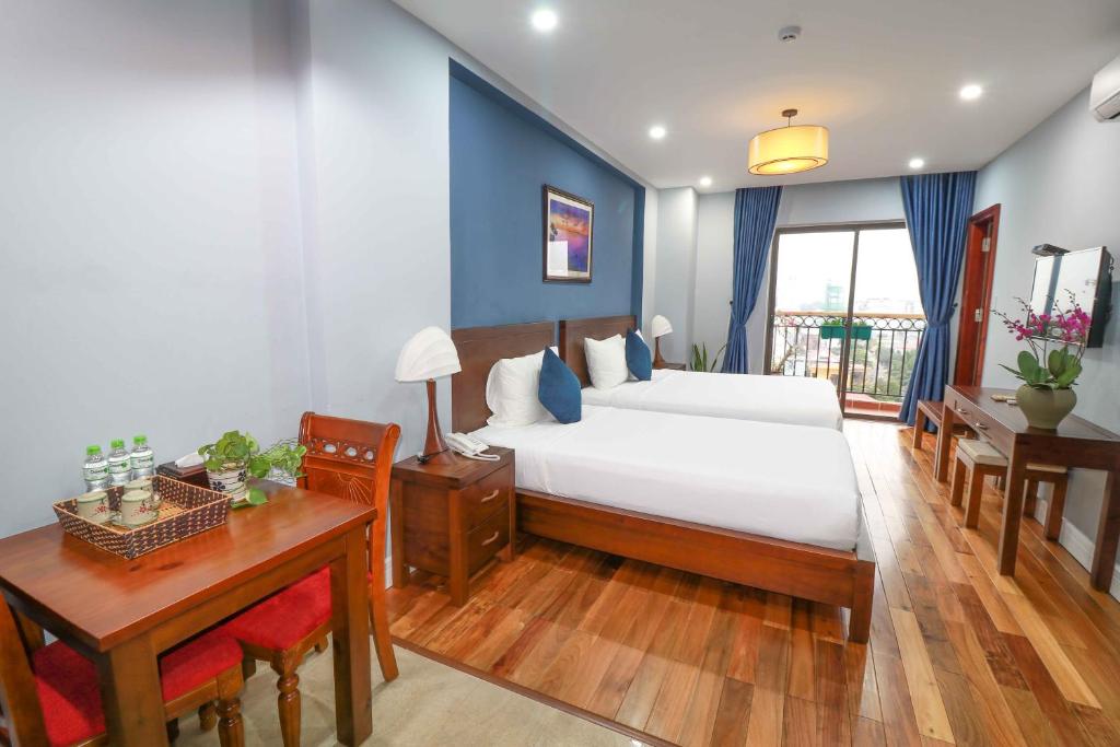 Семейный (Eco Family Room with Balcony) отеля Eco Green Boutique Hotel Da Nang, Дананг